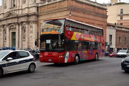Tourist bus of company Sightseeing Roma in central Rome, Italyのeditorial素材