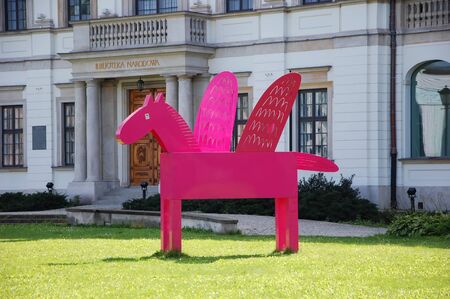 Landscape design. Pink winged horse in front of the Public Library in Warsaw, Polandのeditorial素材