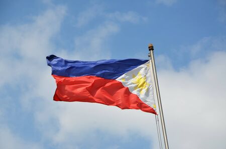 National flag of Philippines on the sky backgroundの写真素材