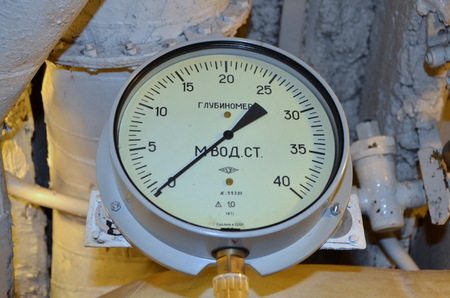 ST-PETERSBURG, RUSSIA - JUNE 5, 2013 - Interior of Soviet submarine S-189. Vintage depth gaugeのeditorial素材