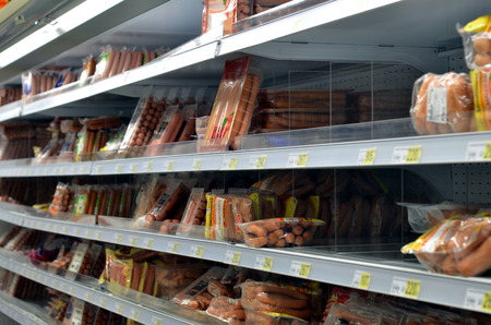 SAINT-PETERSBURG, RUSSIA - DEC 10, 2012 - Sale of sausages in  supermarketのeditorial素材