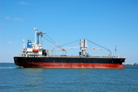 LISBON, PORTUGAL - JULY 9, 2011 - Cargo ship on the Tagus river in Lisbon, Portugalのeditorial素材