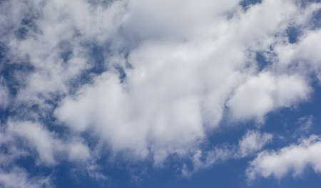 Blue sky with clouds on a sunny day