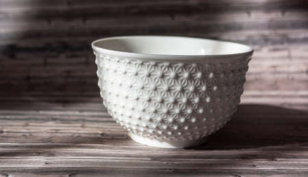 empty chinese rice bowl on a wooden backgroundの写真素材