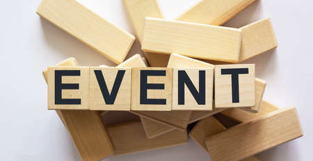 Event word written in wooden cube and white background
