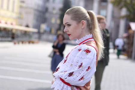 Belarus, Minsk city, September 3, 2016. City Day celebration. Freedom Square. Belarusian woman in national Slavic costume.のeditorial素材