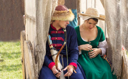 A girl and a man in medieval costumes at the city festival in Minsk. Belarus. September 8, 2018のeditorial素材