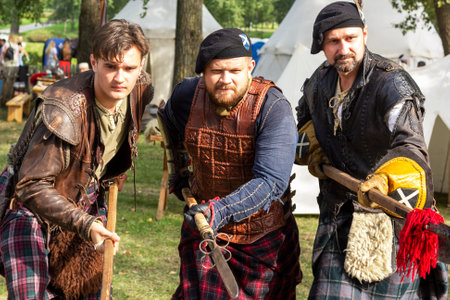 Minsk, Belarus - September 8, 2018 City holiday. Men in the image of the Scottish infantry.