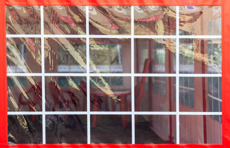 A portable outdoor cafe in the summer heat. Oilcloth cafe tentの写真素材