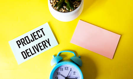 Sticker with the text PROJECT DELIVERY. Yellow background. Businessの写真素材