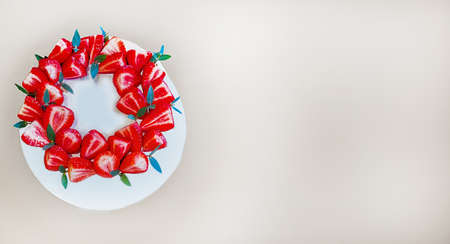 fresh sweet large strawberries on a light background