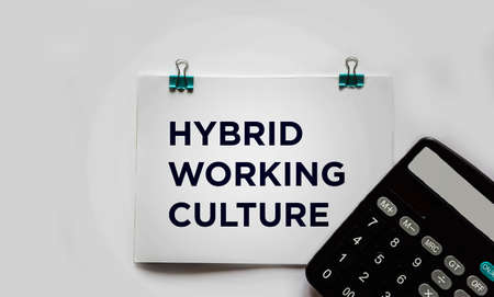 Hybrid work culture shown with text on white backgroundの写真素材