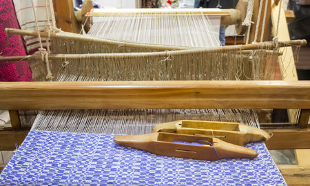 Old spinning or looms in a Slavic house. selective focus