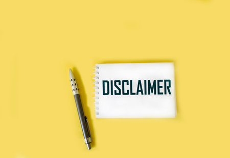 Notepad with text DISCLAIMER on yellow background. business concept.の写真素材