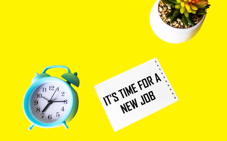 Text sign showing It's time for a new job on yellow backgroundの写真素材