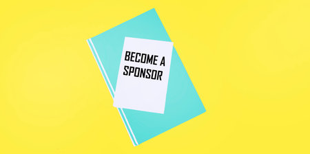 Text become sponsor on a sticky note with green pad and yellow background. Finance and economics...
