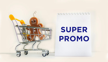 Notepad with the text SUPER promotion, super promotions for various products sold in supermarkets, retail food productsの写真素材