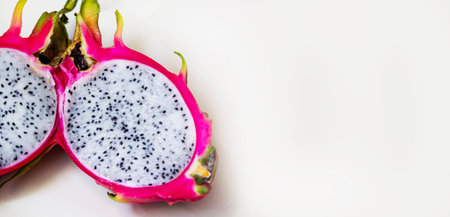 Dragon fruit, Hylocereus undatus, white-fleshed pitaya, cactus vine producing red oblong or oval fruits with large bracts, white flesh and small black seedsの写真素材