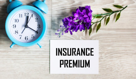 written on a notebook in combination with a watchの写真素材