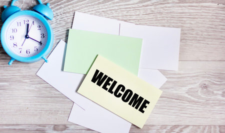 The concept word WELCOME on the sticker. The greeting symbol