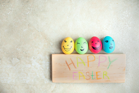 Group of chicken eggs with various emotions.Easter, top viewの写真素材