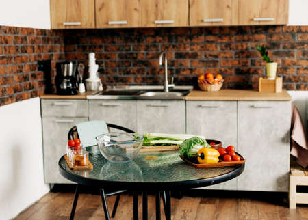 Fresh vegetables on the kitchen table for healthy food preparationの写真素材