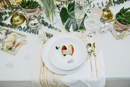 beautiful and cozy bright easter table decorationの写真素材