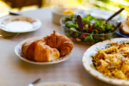 Breakfast on the table in the yard in the summertime