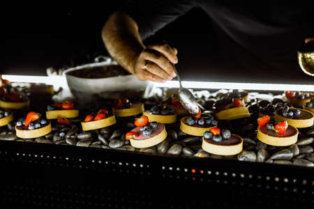 modern sweet dessert with frozen ingredients and fruitsの写真素材
