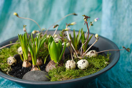 easter decoration for the table with flowers and eggs