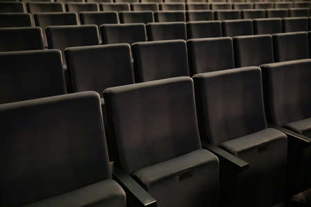 Empty dark gray seats in the theatre at lockdownの写真素材