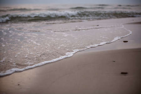 Beautiful sea landscape on the beach in the evening. Selective focus.