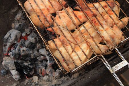 barbecue picnic, coals in the grillの写真素材