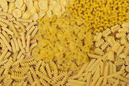 Assortment of Italian pasta textured background.の写真素材