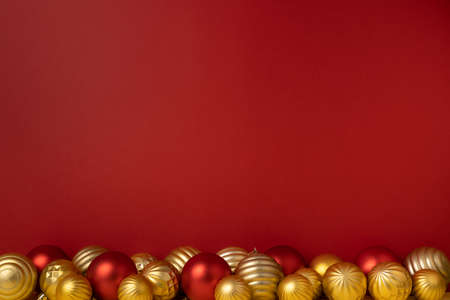Red Christmas with red and yellow baublesの写真素材