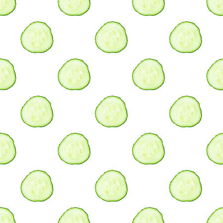 Fresh cucumber slices or cross-sections on white background seamless pattern.の写真素材