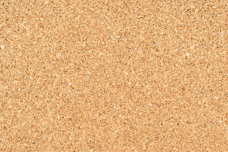 Cork textured background. Cork board image with copy space. Cork for underlay in flooring.の写真素材
