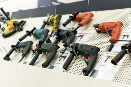 Showcase with power tool drills in hardware store.の写真素材