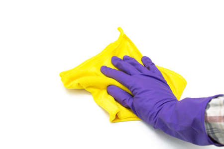 Hand in rubber glove holding microfiber cloth for cleaning, isolated on white background.