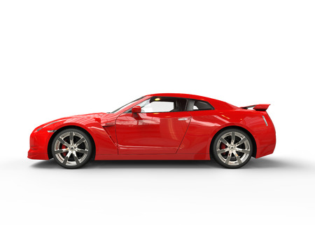 Fast red car side viewの写真素材