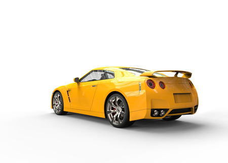 Really fast yellow car back viewの写真素材