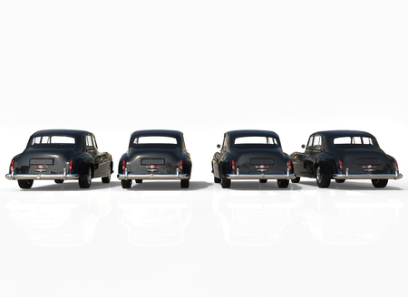 Four classic cars black backの写真素材