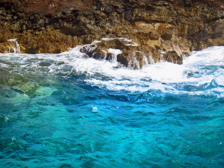 Sea wawes on the cliff sideの写真素材