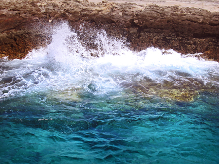 Crashing wawes on the cliff sideの写真素材