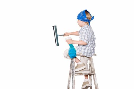 Boy washing the wall sitting on the stairsの写真素材
