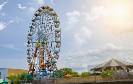 Ferris wheel against blue skyの写真素材