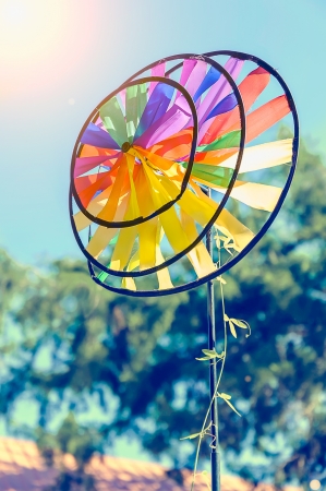 One multi-coloured windmill の写真素材