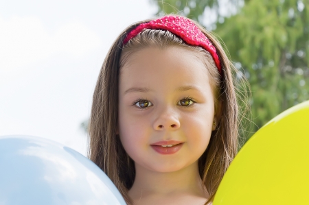 portrait of happy girl in parkの写真素材