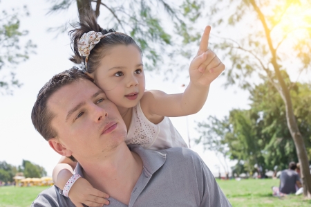 Daughter with her father in the parkの写真素材