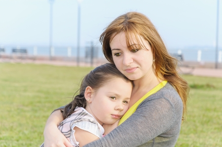 mother with daughter in outdoorの写真素材
